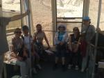 Grupo no teleférico, na descida da Masada.