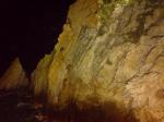 Clavadistas subindo a pedra antes de saltar.